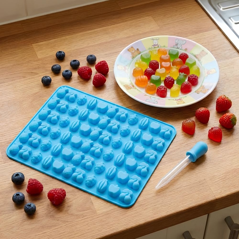 Silicone mold for candies with a dropper 