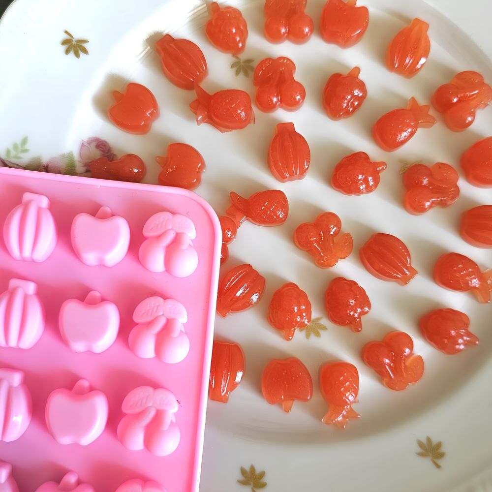 Silicone mold for candies with a dropper 
