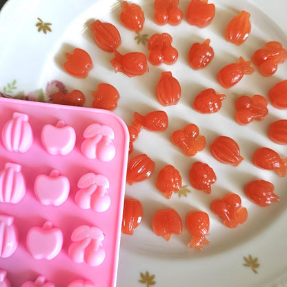 Silicone mold for candies with a dropper 